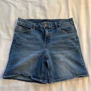 poured in blue jorts